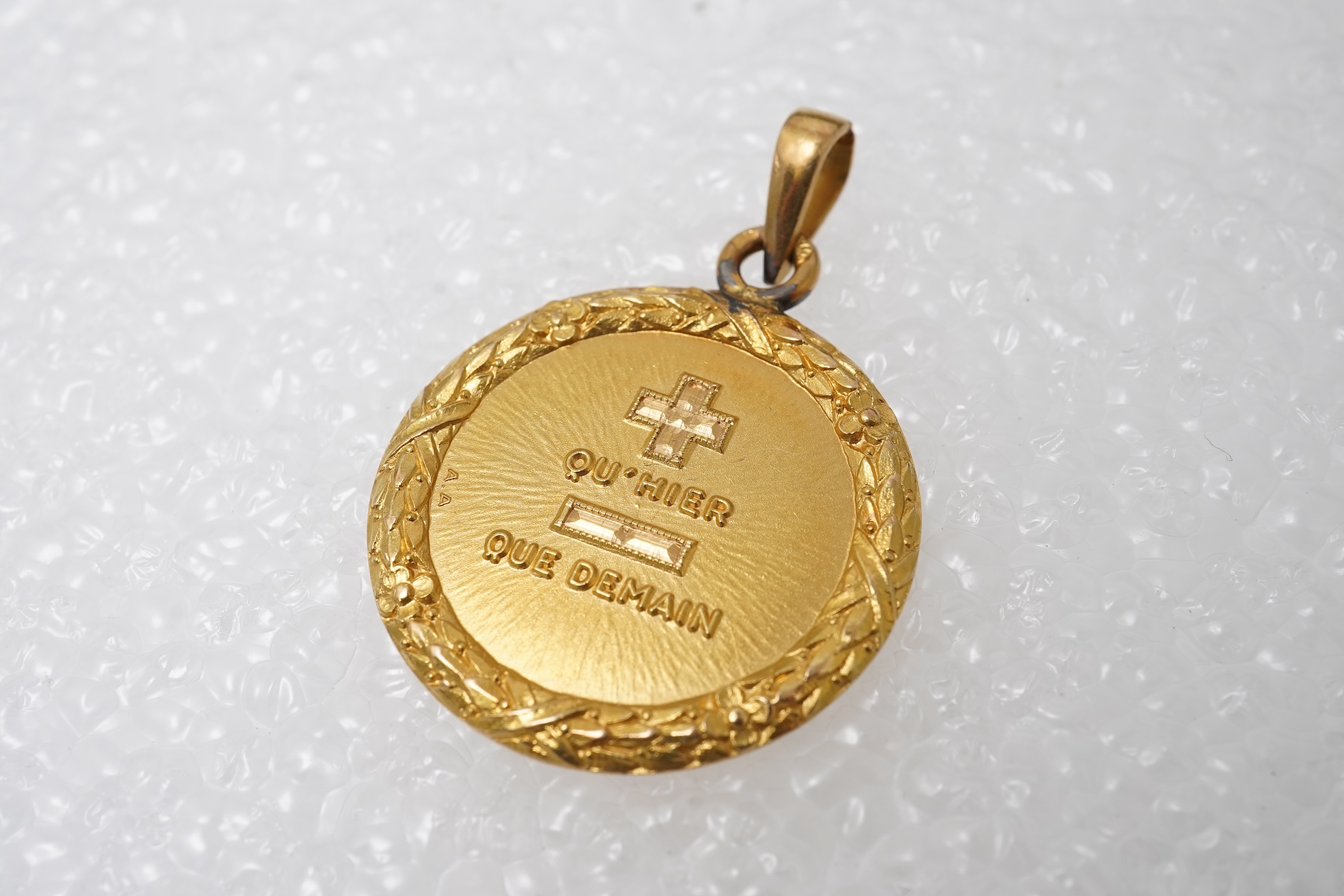 Alphonse Auguis, a medallion pendant, France, early 20th century